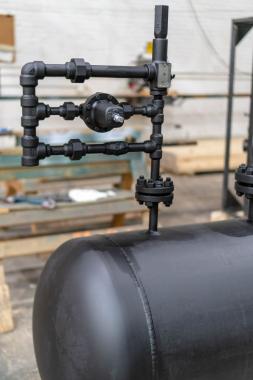 close up of black inert gas blanket tank